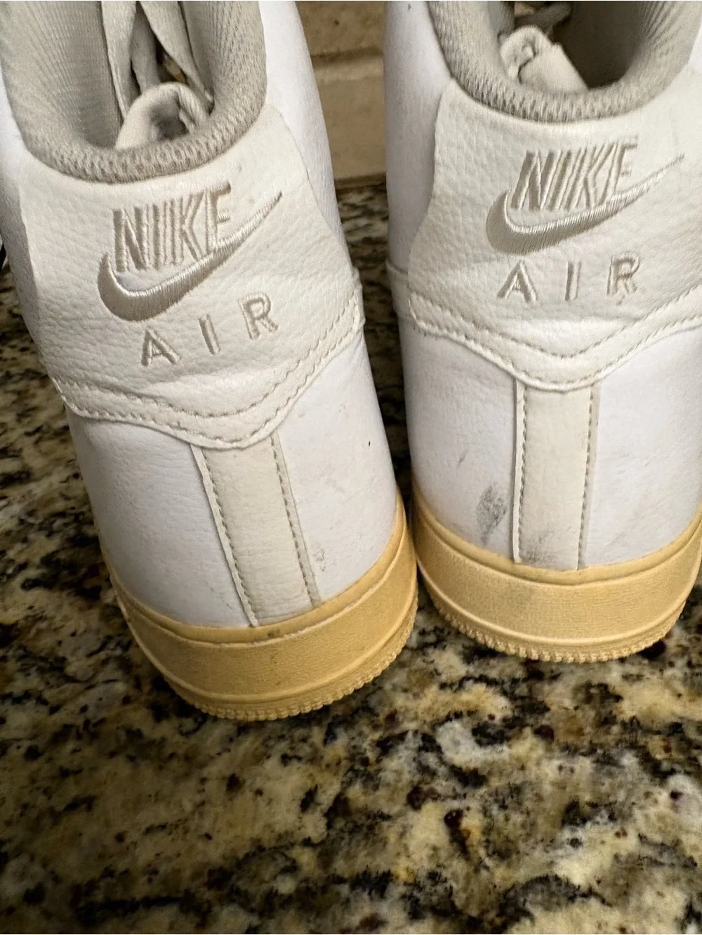 Nike White High-Top Sneakers with Cream Sole